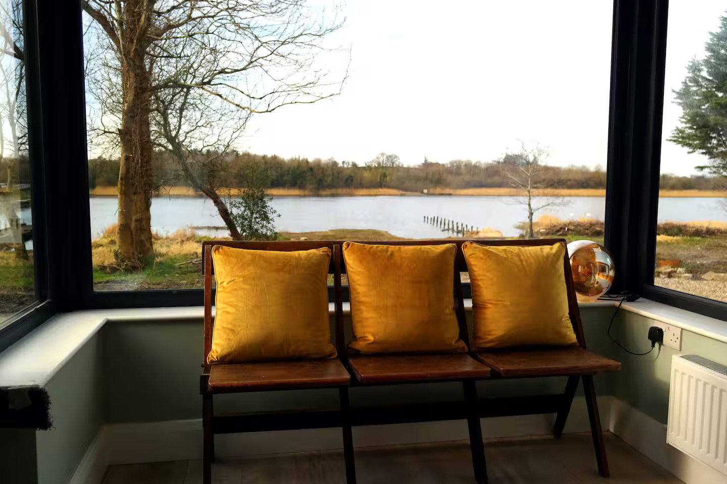 Luxury lakeside accommodation interior at Erinona, Fermanagh - comfortable seating area with lake views